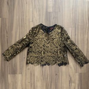 Black cropped blouse with crochet design in gold